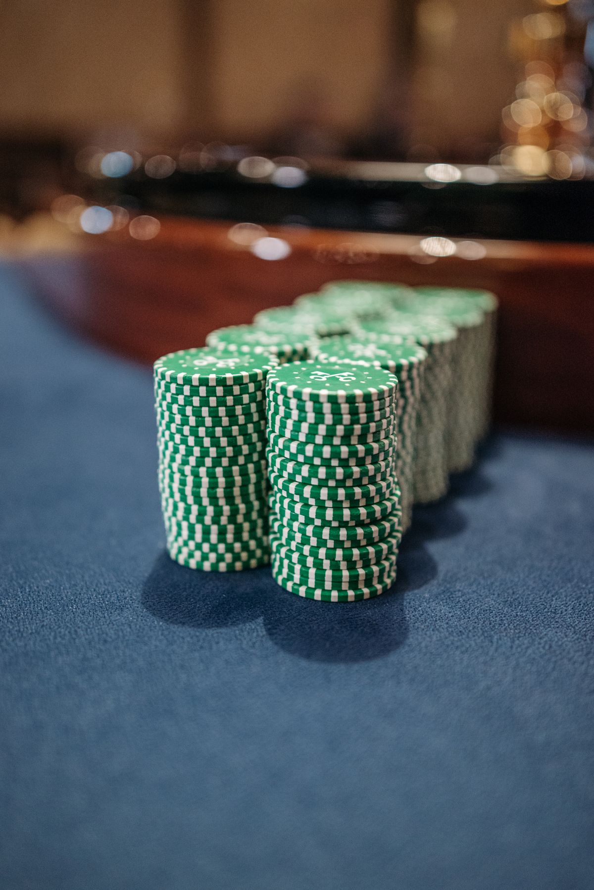 Poker player holding a hand of cards